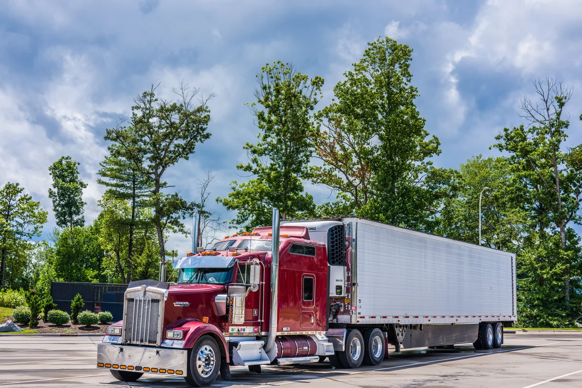 An American semi tractor and trailer on the interstate